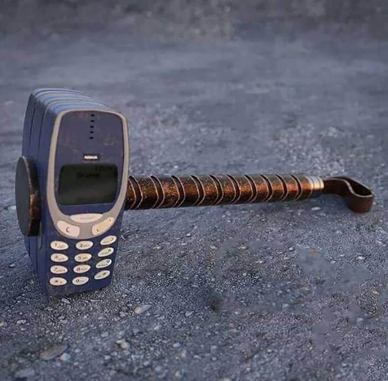 nokia 3310 mounted on a hammer